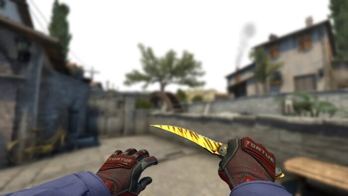 Flip Knife | Tiger Tooth (Factory New) - Imagem 2